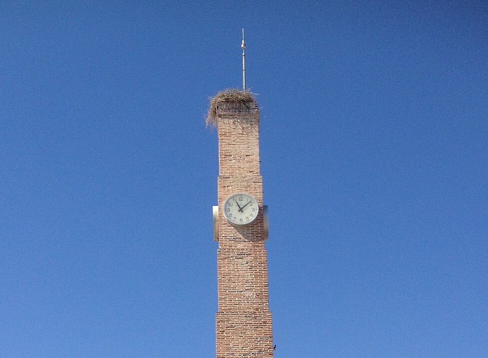 An old brick clock tower in Taşucu, Mersin province